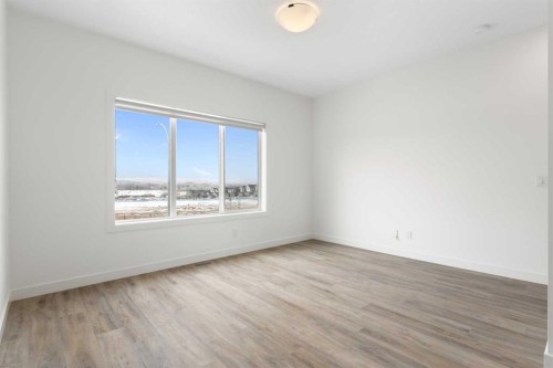 1701-24 Rivercrest Drive, Cochrane, AB - Indoor Photo Showing Other Room