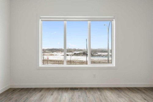 1701-24 Rivercrest Drive, Cochrane, AB - Indoor Photo Showing Other Room