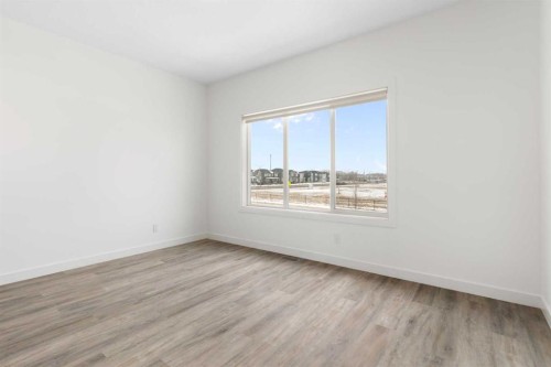 1701-24 Rivercrest Drive, Cochrane, AB - Indoor Photo Showing Other Room