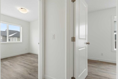 1701-24 Rivercrest Drive, Cochrane, AB - Indoor Photo Showing Other Room