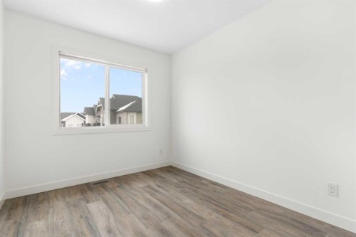 1701-24 Rivercrest Drive, Cochrane, AB - Indoor Photo Showing Other Room