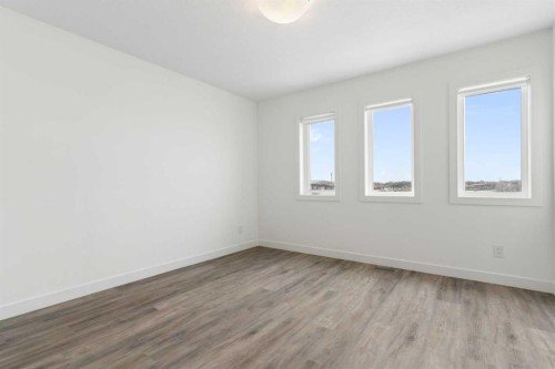 1701-24 Rivercrest Drive, Cochrane, AB - Indoor Photo Showing Other Room