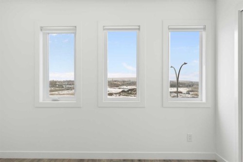 1701-24 Rivercrest Drive, Cochrane, AB - Indoor Photo Showing Other Room