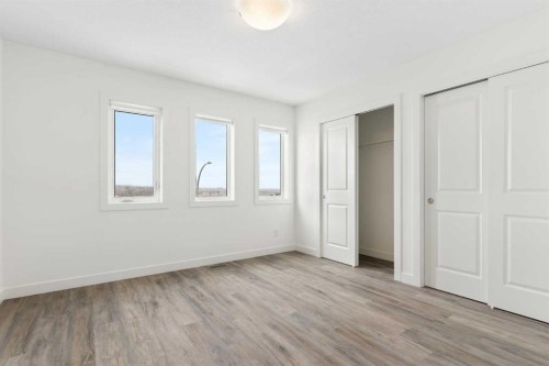 1701-24 Rivercrest Drive, Cochrane, AB - Indoor Photo Showing Other Room