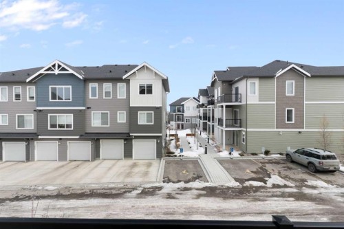 1701-24 Rivercrest Drive, Cochrane, AB - Outdoor With Facade