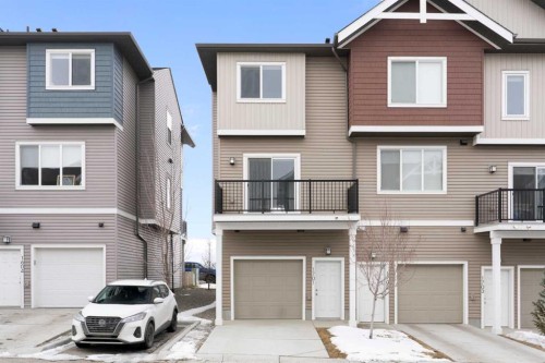 1701-24 Rivercrest Drive, Cochrane, AB - Outdoor With Facade