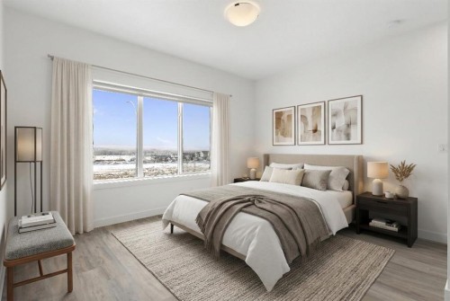 1701-24 Rivercrest Drive, Cochrane, AB - Indoor Photo Showing Bedroom