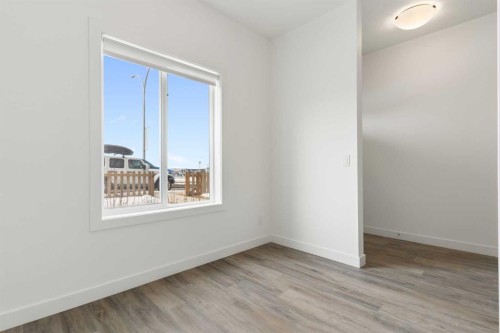 1701-24 Rivercrest Drive, Cochrane, AB - Indoor Photo Showing Other Room