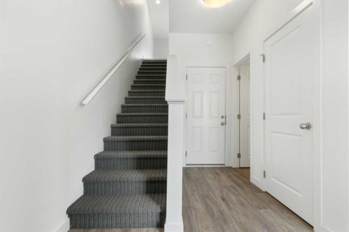 1701-24 Rivercrest Drive, Cochrane, AB - Indoor Photo Showing Other Room