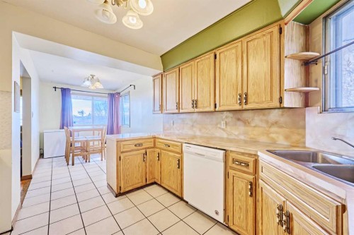 28 Cornell Place Nw, Calgary, AB - Indoor Photo Showing Kitchen With Double Sink