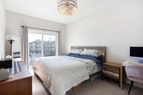 412-250 Fireside View, Cochrane, AB - Indoor Photo Showing Bedroom