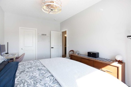 412-250 Fireside View, Cochrane, AB - Indoor Photo Showing Bedroom