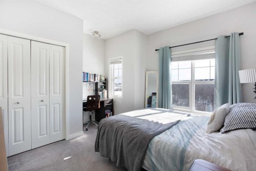 412-250 Fireside View, Cochrane, AB - Indoor Photo Showing Bedroom