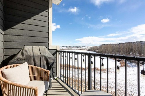 412-250 Fireside View, Cochrane, AB - Outdoor With Balcony With Exterior