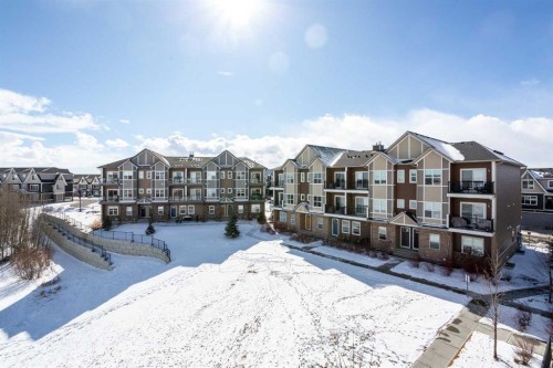 412-250 Fireside View, Cochrane, AB - Outdoor With Balcony With Facade
