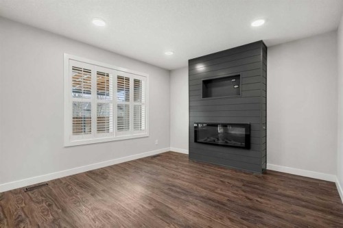 175 Kincora Crescent Nw, Calgary, AB - Indoor Photo Showing Other Room With Fireplace
