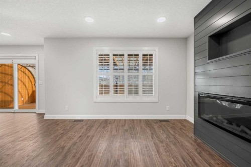 175 Kincora Crescent Nw, Calgary, AB - Indoor Photo Showing Other Room With Fireplace