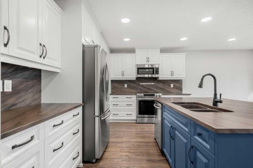 175 Kincora Crescent Nw, Calgary, AB - Indoor Photo Showing Kitchen With Stainless Steel Kitchen With Double Sink