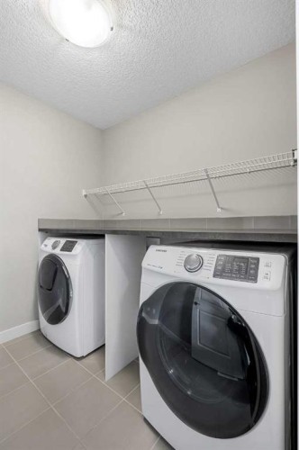 175 Kincora Crescent Nw, Calgary, AB - Indoor Photo Showing Laundry Room