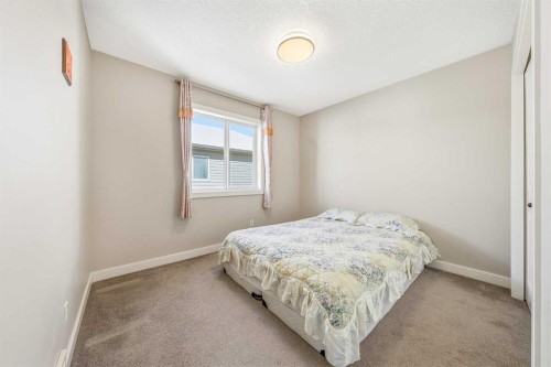91 Bridlecrest Street Sw, Calgary, AB - Indoor Photo Showing Bedroom