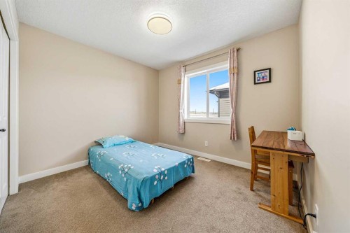 91 Bridlecrest Street Sw, Calgary, AB - Indoor Photo Showing Bedroom