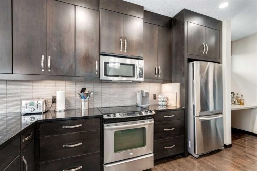 80 Auburn Springs Boulevard Se, Calgary, AB - Indoor Photo Showing Kitchen With Stainless Steel Kitchen With Upgraded Kitchen