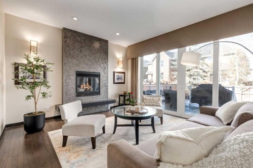 80 Auburn Springs Boulevard Se, Calgary, AB - Indoor Photo Showing Living Room With Fireplace
