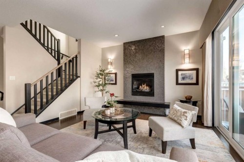 80 Auburn Springs Boulevard Se, Calgary, AB - Indoor Photo Showing Living Room With Fireplace
