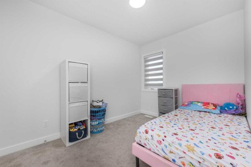308 Sora Terrace Se, Calgary, AB - Indoor Photo Showing Bedroom