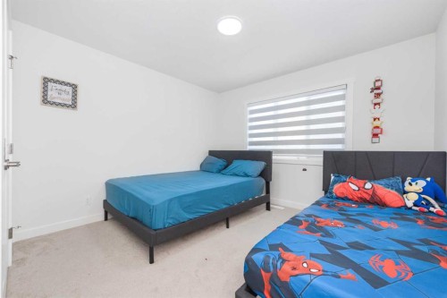 308 Sora Terrace Se, Calgary, AB - Indoor Photo Showing Bedroom