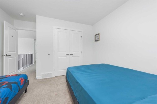 308 Sora Terrace Se, Calgary, AB - Indoor Photo Showing Bedroom