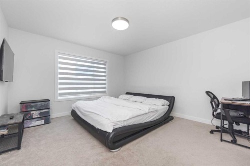 308 Sora Terrace Se, Calgary, AB - Indoor Photo Showing Bedroom