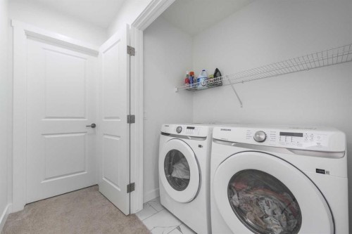 308 Sora Terrace Se, Calgary, AB - Indoor Photo Showing Laundry Room