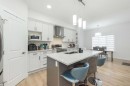 308 Sora Terrace Se, Calgary, AB  - Indoor Photo Showing Kitchen With Double Sink With Upgraded Kitchen 