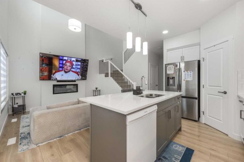 308 Sora Terrace Se, Calgary, AB - Indoor Photo Showing Kitchen With Double Sink
