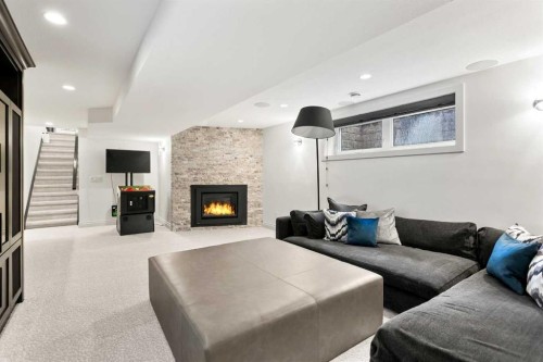 10 Willow Park Green Se, Calgary, AB - Indoor Photo Showing Living Room With Fireplace