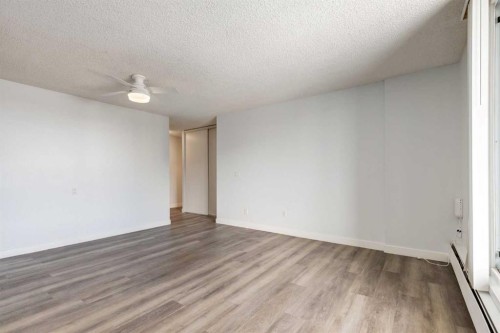 1114-4944 Dalton Drive Nw, Calgary, AB - Indoor Photo Showing Other Room