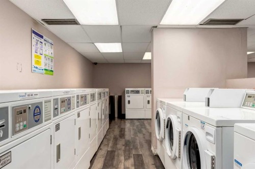 1114-4944 Dalton Drive Nw, Calgary, AB - Indoor Photo Showing Laundry Room