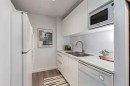 1114-4944 Dalton Drive Nw, Calgary, AB  - Indoor Photo Showing Kitchen With Double Sink 