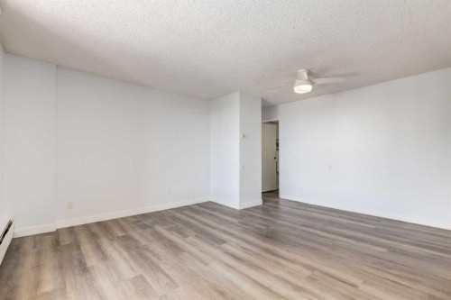 1114-4944 Dalton Drive Nw, Calgary, AB - Indoor Photo Showing Other Room