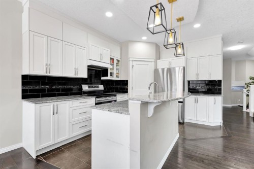 177 Cougar Ridge Close Sw, Calgary, AB - Indoor Photo Showing Kitchen With Stainless Steel Kitchen With Upgraded Kitchen