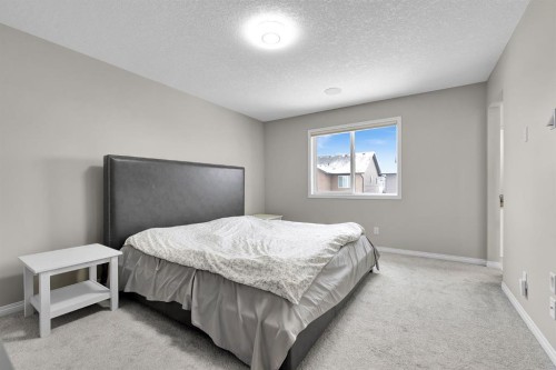 177 Cougar Ridge Close Sw, Calgary, AB - Indoor Photo Showing Bedroom