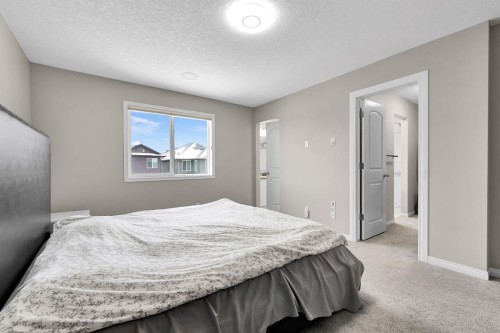 177 Cougar Ridge Close Sw, Calgary, AB - Indoor Photo Showing Bedroom