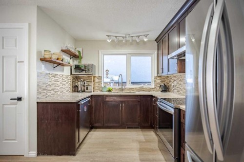 4803 Brockington Road Nw, Calgary, AB - Indoor Photo Showing Kitchen With Upgraded Kitchen