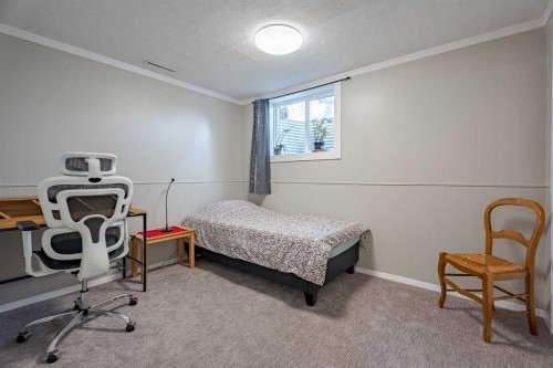 4803 Brockington Road Nw, Calgary, AB - Indoor Photo Showing Bedroom