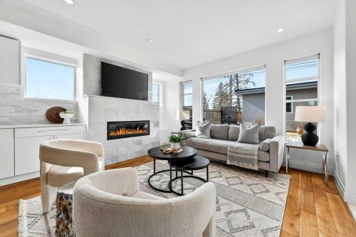 4504 37 Avenue Sw, Calgary, AB - Indoor Photo Showing Living Room With Fireplace