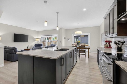 218 Riviera View, Cochrane, AB - Indoor Photo Showing Kitchen With Upgraded Kitchen