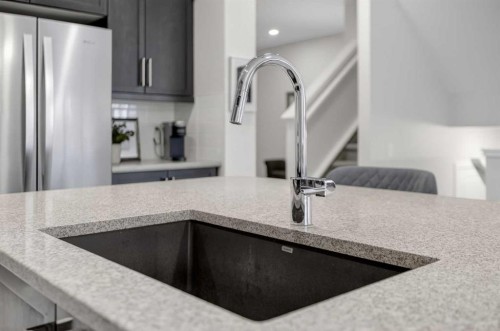 218 Riviera View, Cochrane, AB - Indoor Photo Showing Kitchen With Upgraded Kitchen