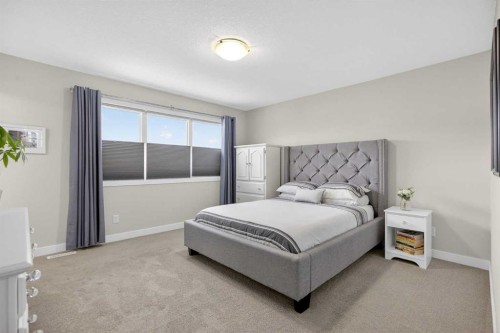 218 Riviera View, Cochrane, AB - Indoor Photo Showing Bedroom