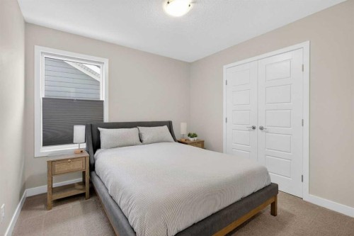 218 Riviera View, Cochrane, AB - Indoor Photo Showing Bedroom